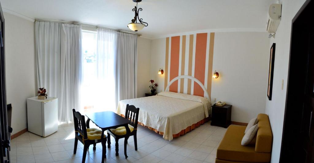 Real Avenida Hotel Тустла-Ґутьєррес Номер фото